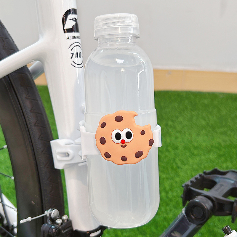 自転車のコップの棚のかわいい漫画のハンドルの多機能のオートバイの電気自動車は通用して飲み物の水筒のブラケットを入れます。|undefined