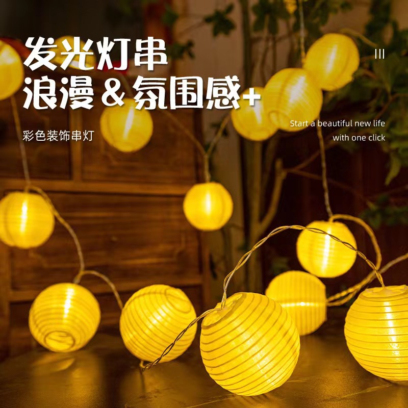 Factory direct sales of new solar-powered outdoor fabric lanterns and string lights for Christmas, large outdoor courtyard waterproof decorations.