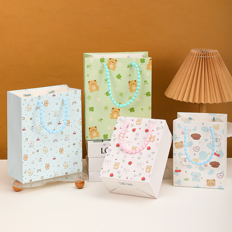 Nuevas bolsas de regalo exquisitas con diseño de animales de dibujos animados en relieve con cuerda de burbujas, directamente del fabricante, para el Día de la Mujer y San Valentín.