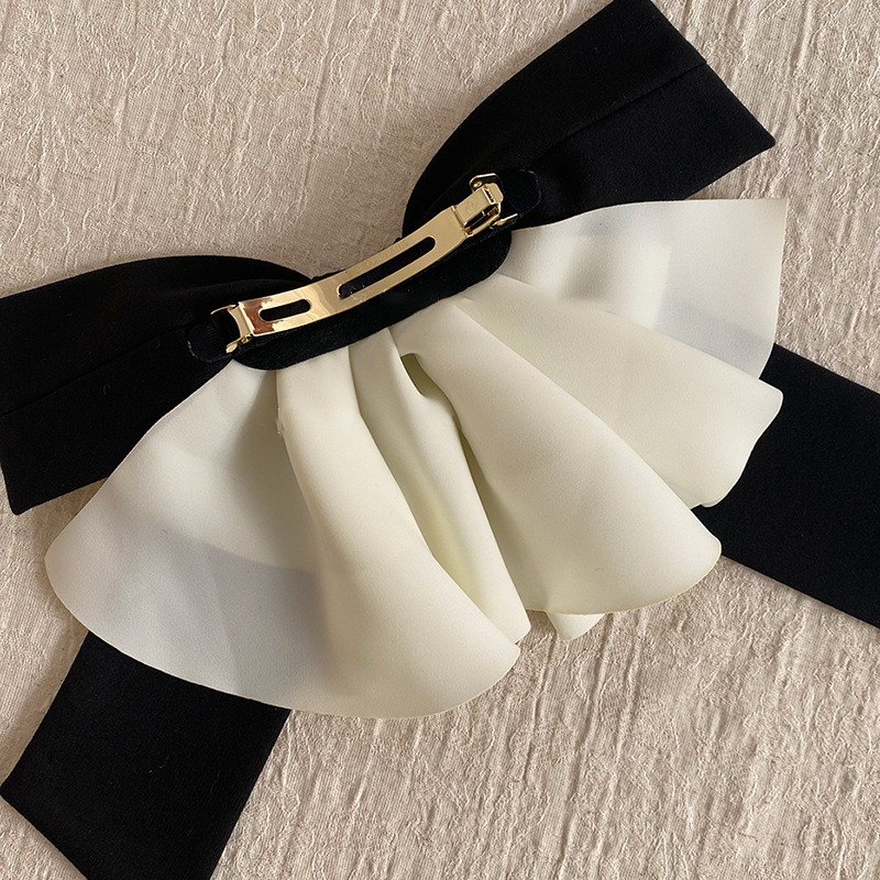 Fermaglio per capelli con fiocco in raso accessorio elegante_voghion.com