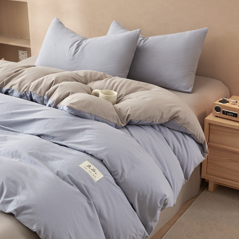 Nuevo traje de cama de algodón lavado de algodón de cuatro piezas de algodón 2025 nuevo traje de dormitorio de funda de edredón de sábana simple de tres piezas