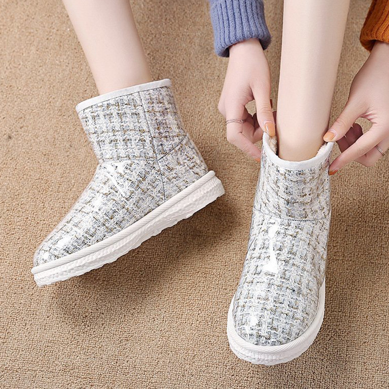 Botas de nieve de moda para mujeres nuevos zapatos de algodón de nieve antideslizantes impermeables gruesos con forro polar para mujeres