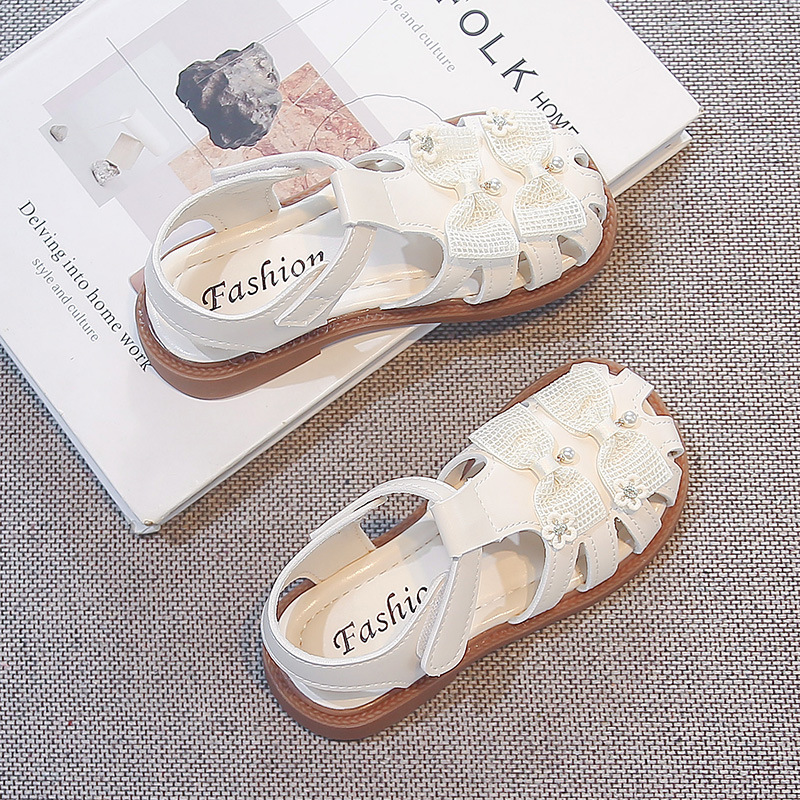Sandallas de niñas verano 2026 nuevo estilo de moda infantil zapatos casuales versátiles arco sandalias de cabeza de bolsa zapatos princesa image 7
