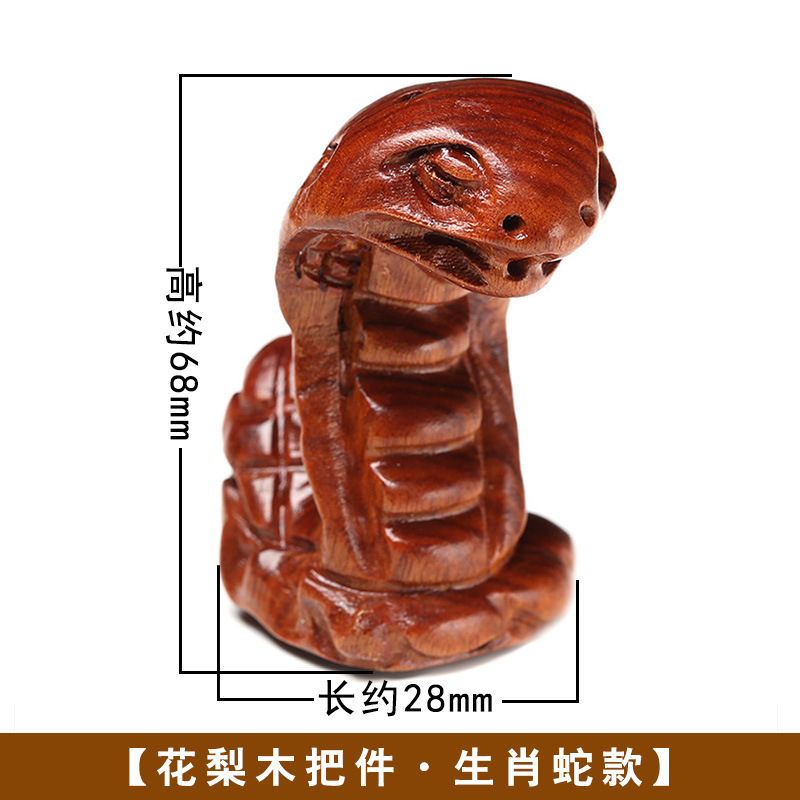 黄花梨の取っ手の件の木はクルミのヒョウタンの十二生肖の文を彫って赤い木の彫刻の小さい掛け金を彫って中実の置物を並べます。|undefined
