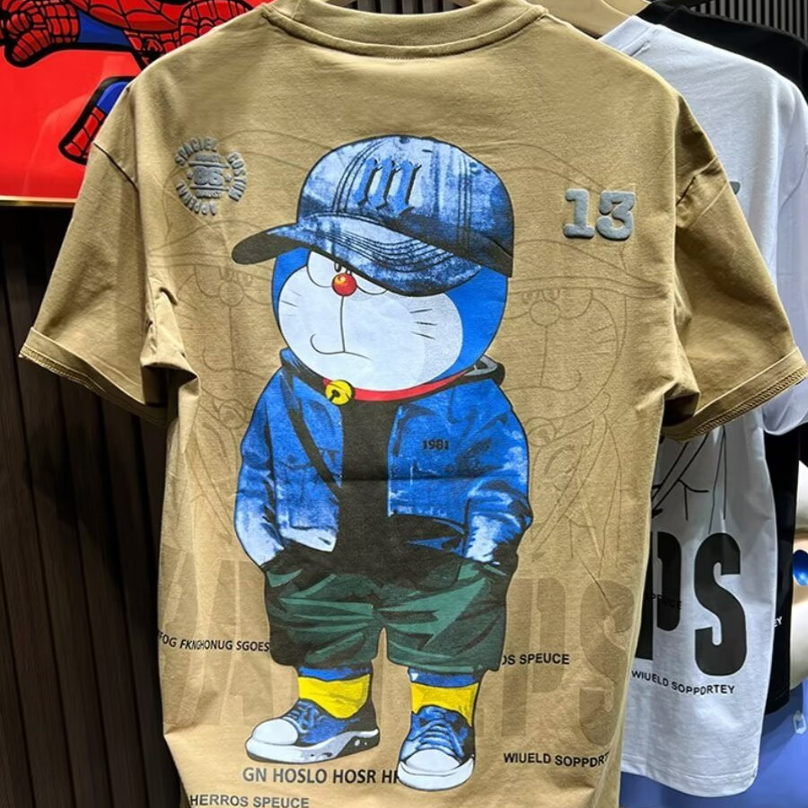 Marca de moda impresión de dibujos animados camiseta de manga corta para hombres verano camiseta de cuello redondo de media manga adolescente ropa casual suelta