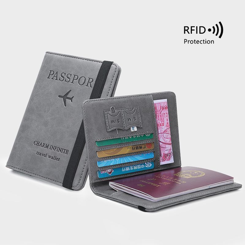 Bolsa de pasaporte de alto valor de cara cubierta de cuero PU simple moda dos en uno cepillo antirrobo de viaje pasaporte