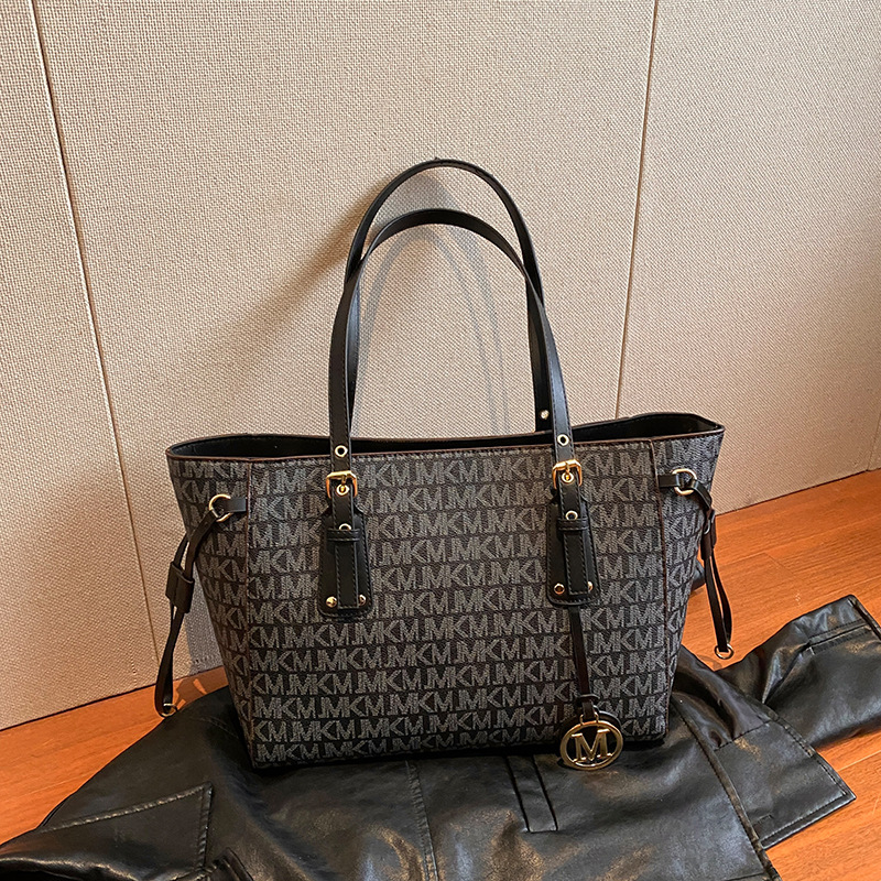 2025 nuevo bolso popular de este año bolso de hombro de textura de moda de gran capacidad para mujer otoño e invierno bolso de viaje de todo fósforo