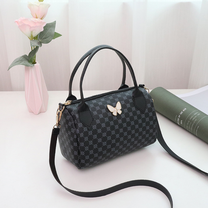 Bolso de mujer 2023 nuevo círculo impresión colgante mariposa bolso de almohada de mano bolso de teléfono móvil casual bolso de comercio exterior image 6