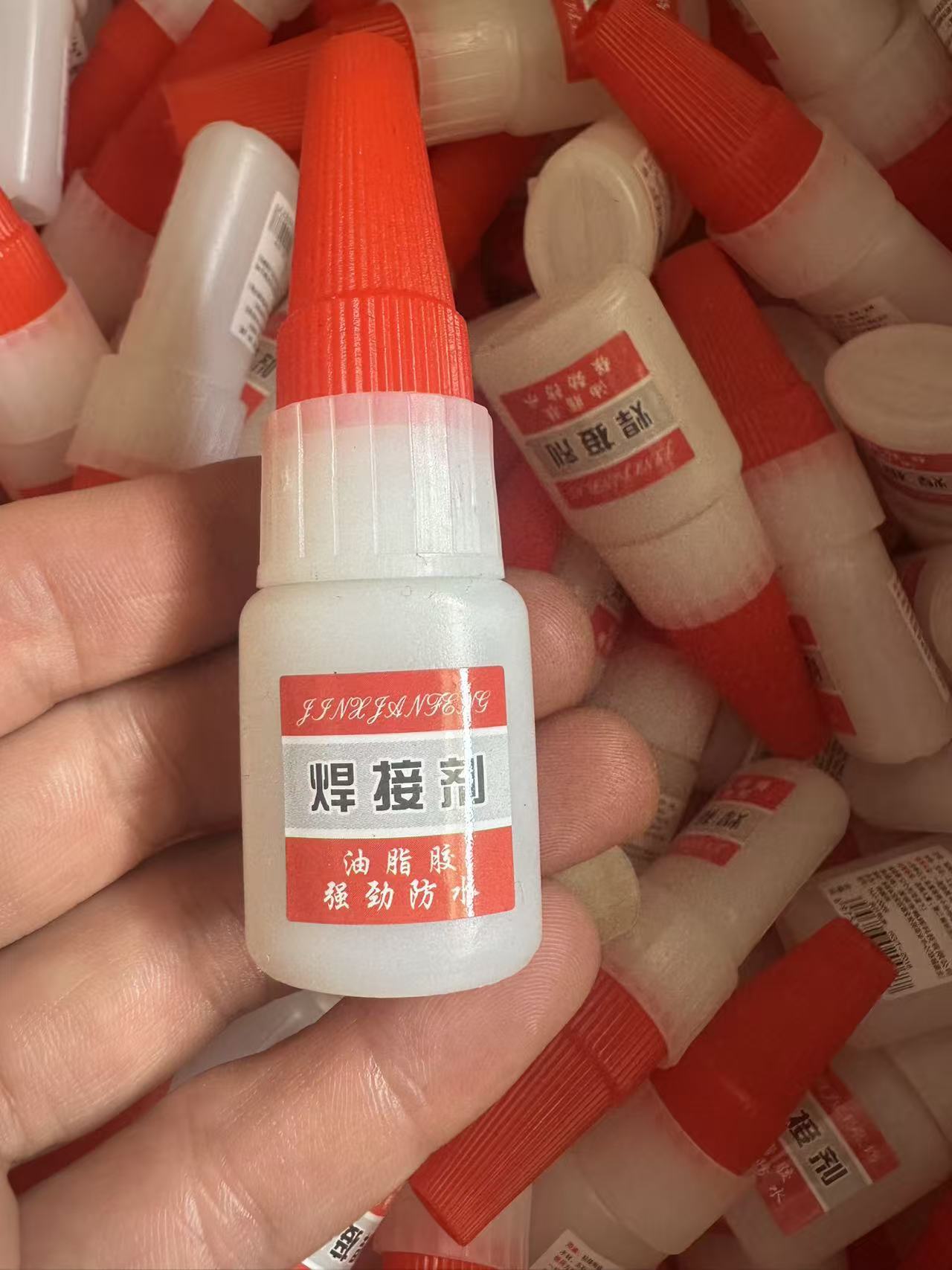 alta viscosidad nova Guangfa pegamento aceitoso universal fuerte pegamento de soldadura pegamento de zapatos pegamento aceitoso fábrica al por mayor image 17