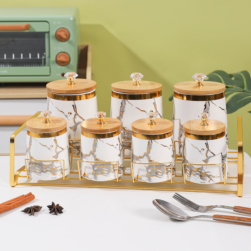 Juego de caja de condimento de comercio exterior de exportación frasco de condimento creativo con estante frasco de sellado de cerámica de lujo ligero frasco de almacenamiento de cocina