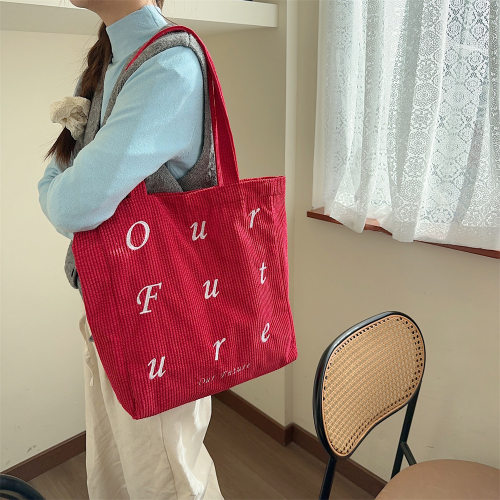 310262 embroidered letter future corduroy single-shoulder Maillard color hand-held canvas bag Women's tote bag undefined