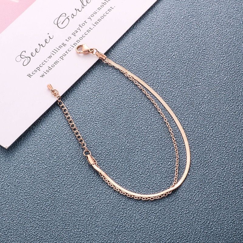 Diseño de nicho de estilo coreano ins Cadena de hueso de serpiente plana simple cadena de hoja de acero de titanio de todo fósforo tobillera personalidad mano de alto grado