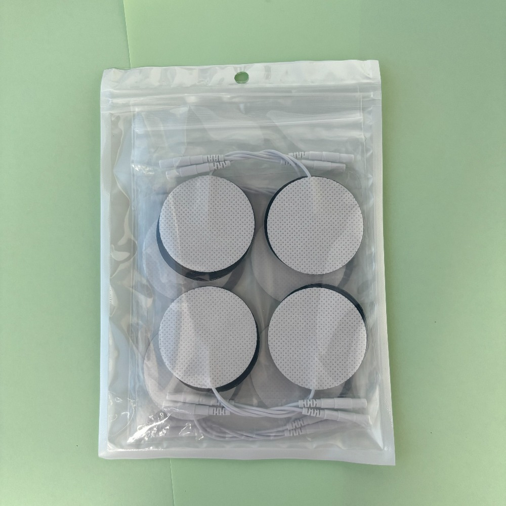 Customizado redondo de 5cm pieza de electrodo de fisioterapia tipo pin autoadhesivo parche de masaje pectoral no tejido parche de electroterapia meridiana