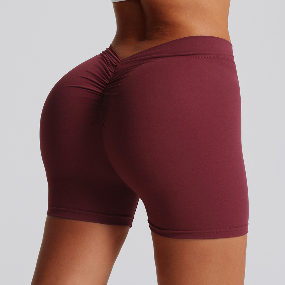 Transfronterizo abrasivo V cintura pliegue de color sólido mel桃 camisa pantalones cortos deportivos para correr fitness tight panty para mujeres