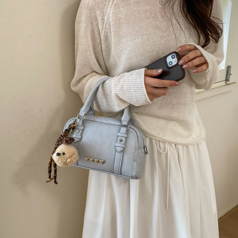 Bolso de mano coreano sensación cotidiana para mujeres 2026 primavera nuevo retro bolso de almohada de hombro para viajar bolso de mujer