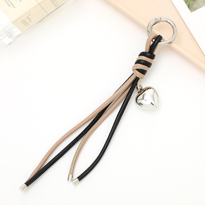 Nuevo tipo de cuerdas de cuero PU llavero colgante in bolsos de moda colgante cadena accesorios DIY tejido a mano