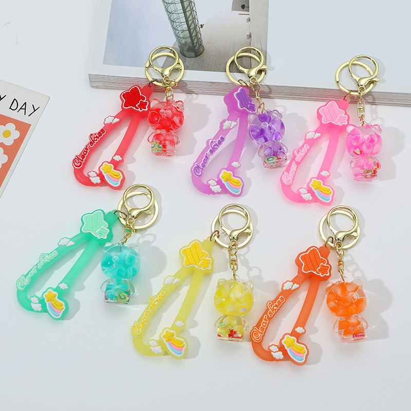 Caricatura KT en botella de arena flotante de aceite en burbujas de aceite llavero llavero de automóvil regalos de vacaciones