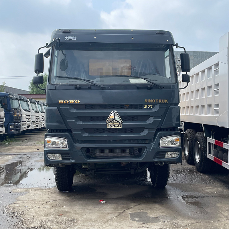 Cross-border heavy-duty HOWO dump truck, eight-wheeled mining engineering truck, right-hand drive, for transporting sand and gravel Cross-border heavy-duty HOWO dump truck, eight-wheeled mining engineering truck, right-hand drive, for transporting sand and gravel