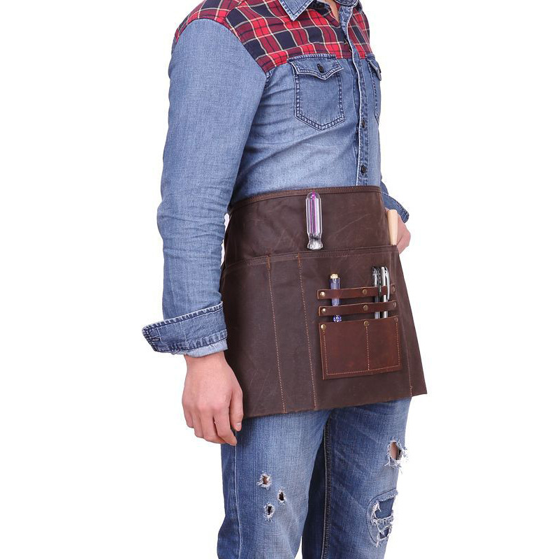 Amazon transfronterizo de lona encerada delantal de la vendimia de cuero de LA PU bolsillo electricista carpintería ropa de trabajo delantal impermeable al por mayor