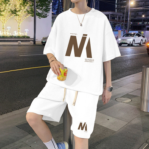 Stylish and handsome honeycomb casual summer short-sleeved T-shirt trend plus-size loose sports shorts two-piece set