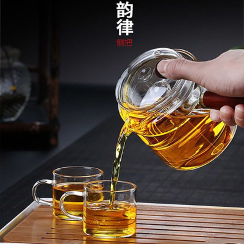 Mango lateral filtro tetera engrosada vidrio borosilicato Kung Fu juego de té traje hogar mango de madera al vapor Té fabricante