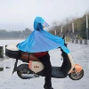 Blue riding flying saucer raincoat