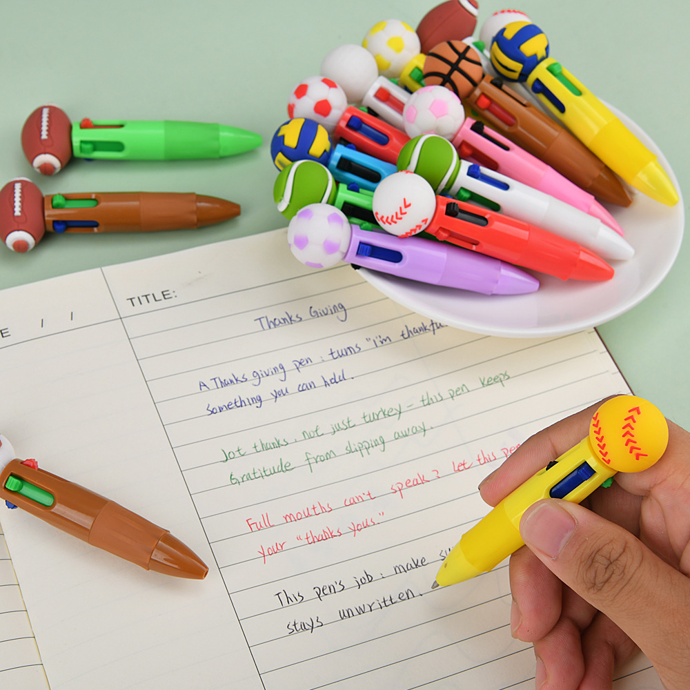 Transfronterizos para bonitos bolígrafos de fútbol, baloncesto, rugby, bolígrafos multicolores de dibujos animados de cuatro colores