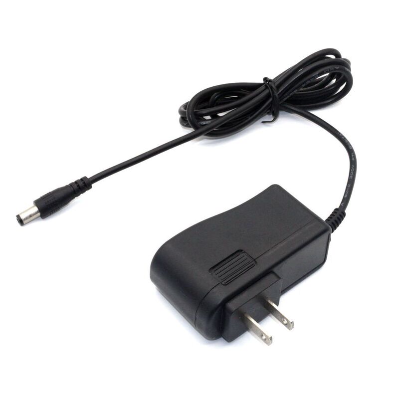 9.5V1A power adapter vertical AC power supply 9.5W uL American standard certified electronic organ power supply 9.5V1A power adapter vertical AC power supply 9.5W uL American standard certified electronic organ power supply