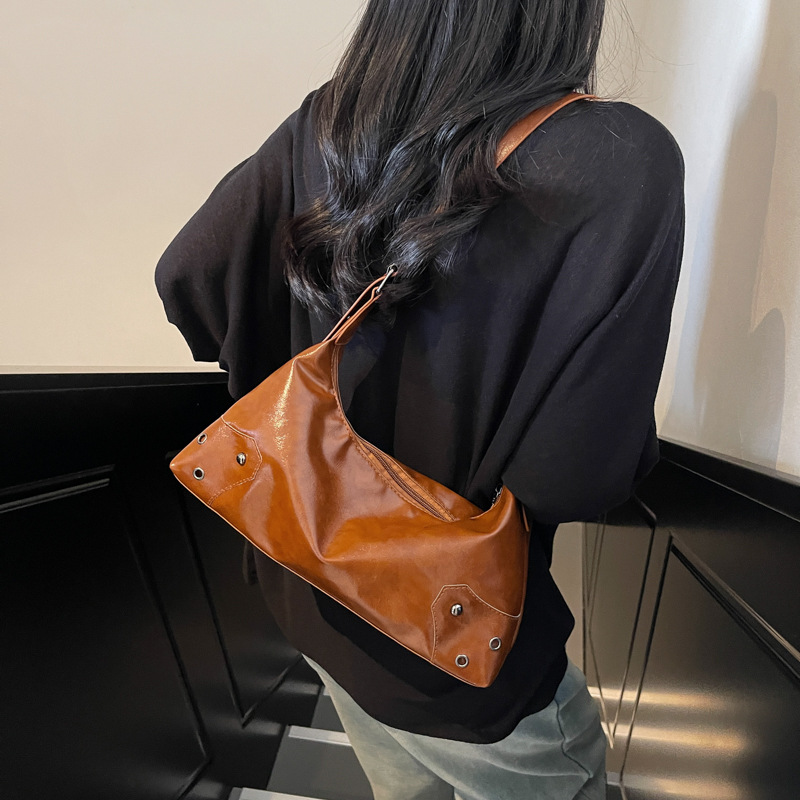 Niche Zhong retro Meilade bolso de brazo para mujeres otoño / invierno 2025 nuevo estilo de estilo extranjero multifuncional de gran capacidad bolso de hombro retro