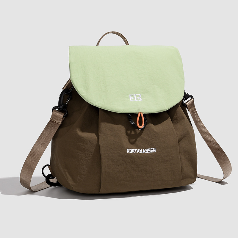 Hombres y mujeres mochila 2025 nueva mochila de estudiantes coreana de gran capacidad, mochila escolar de estilo universitario, mochila de viaje ocio