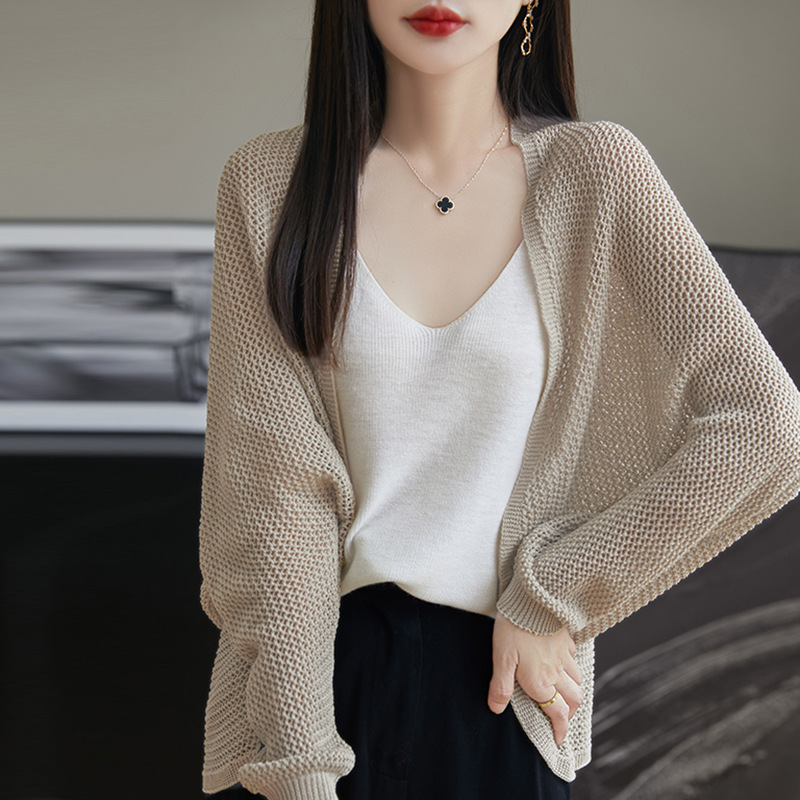 清涼感の薄いタイプの天糸亜麻のボタンなしのエアコンのブラウスの夏の上で新しい純色の百合のリゾート風の日焼け止めのコート|undefined