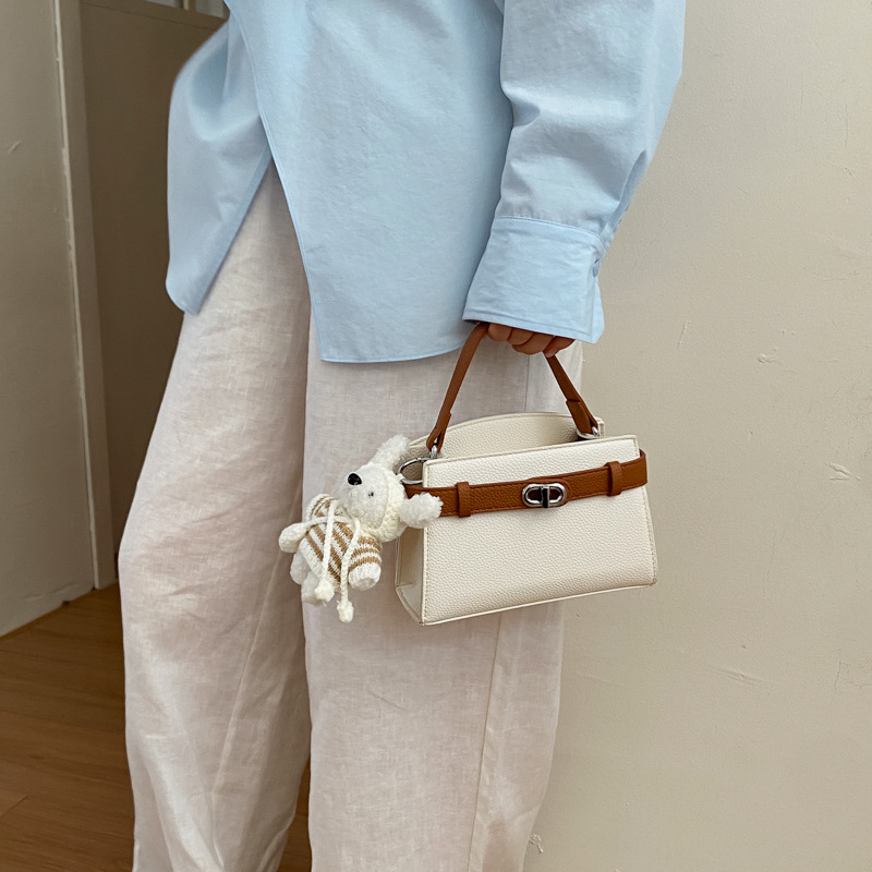 Este año, la moda de Kelly 2026 nuevo estilo femenino de estilo de viaje de moda de color contraste de hombro único bolso de tramo inclinado