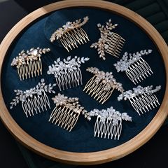 よく売れている花嫁のウェディングドレスの頭飾りにドリルを入れて髪を飾っています。