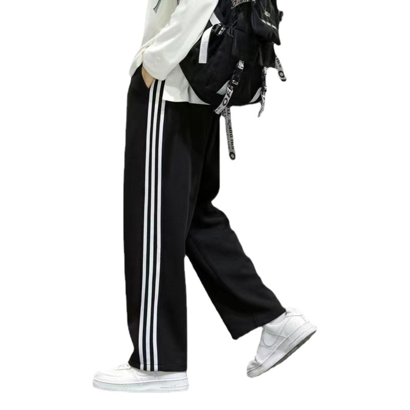 Primavera y otoño tres barras pantalones casuales deportes de los hombres pantalones de chándal recortados de moda marca niños verano Pantalones largos rectos