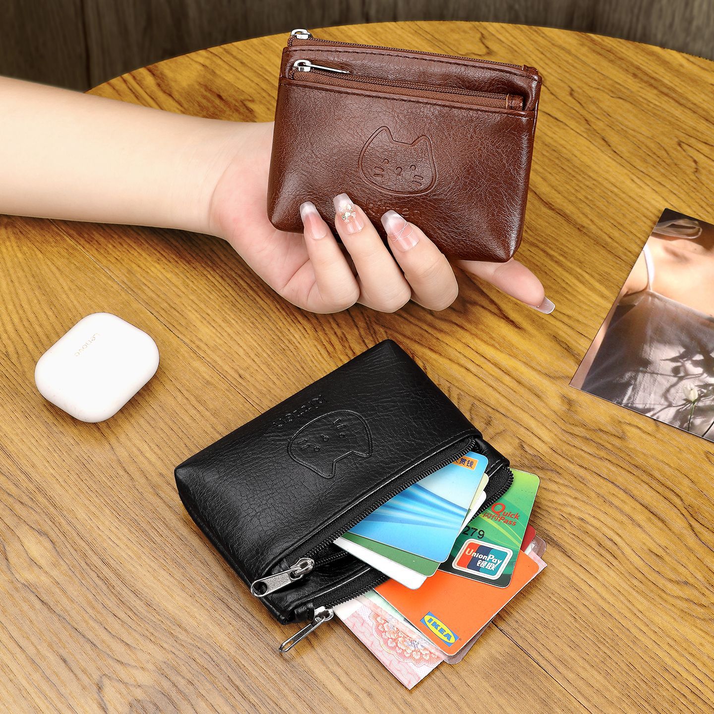 Suministro transfronterizo nuevo gato hecho a mano bolso de cambio de cuero lindo mini auriculares portátiles bolsa de tarjeta pequeña al por mayor