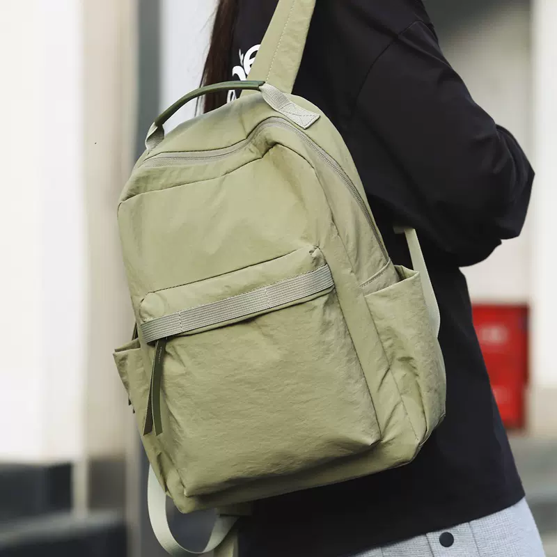 2025新款复古双肩包女小众简约高中生大学生书包登山背包男双肩包