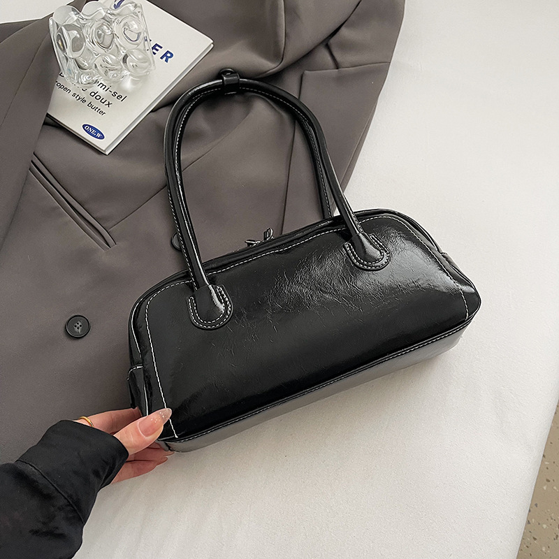 Bolso de axila de nicho transfronterizo femenino 2024 nuevo bolso de bolos portátil retro de moda bolso de viaje de gran capacidad