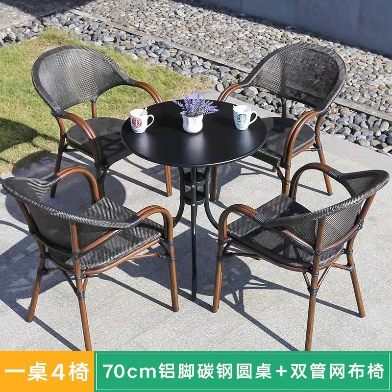 Mesa y silla al aire libre leche tienda de té cafetería silla de malla Silla de ratán Patio de tres piezas balcón mesa y silla de ocio al aire libre