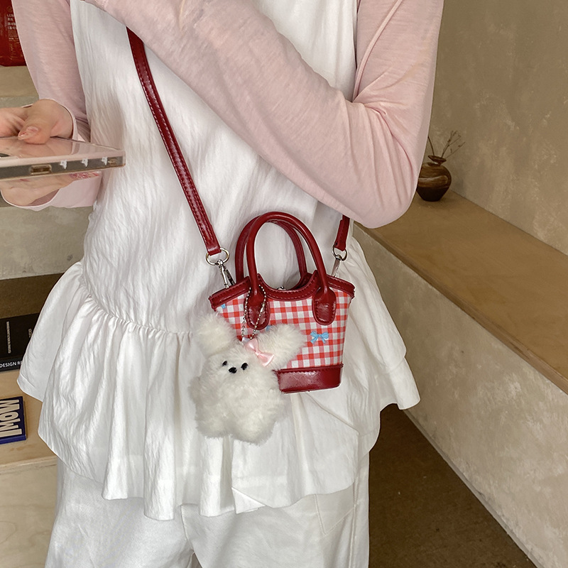 Nuevo tipo de bolso para niños, estilo coreano de moda, bolso de cubo a rejilla, mini bolso de hombro lindo para hombres y mujeres.