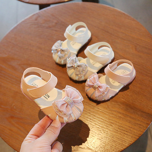 A generation of 2021 summer cartoon children's sandals Baotou girls baby bow sandals soft bottom baby shoes