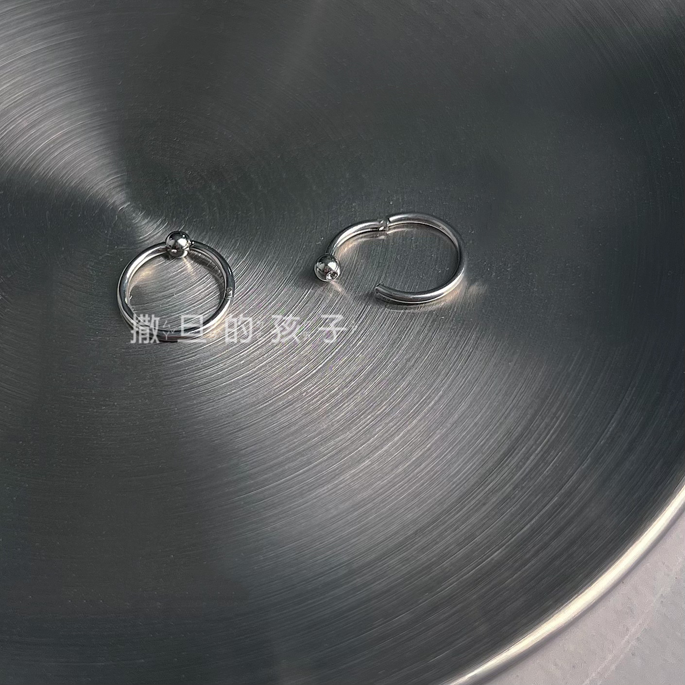 Silver pointed spike labret stud material detail