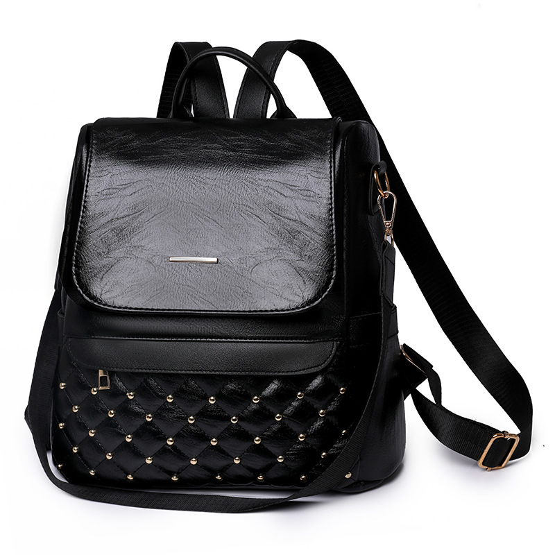 2023 primavera nuevo estilo casual damas remache cuero suave mochila de viaje multifuncional de un solo hombro con hilo de bordar de moda