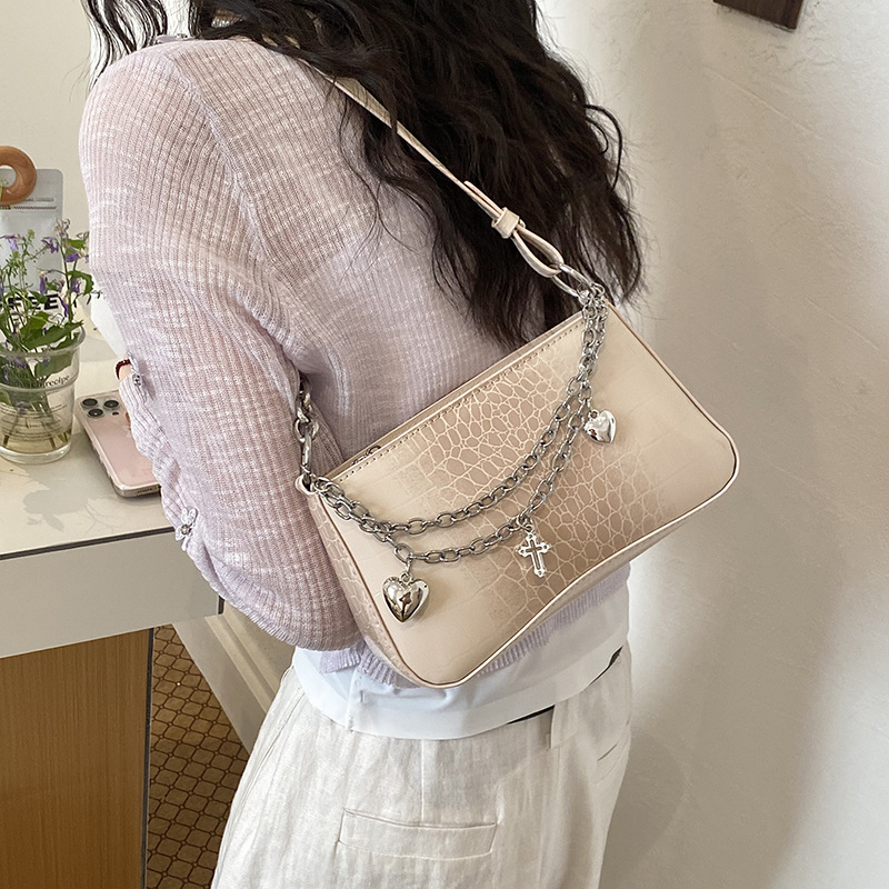 Nicho de diseño de cadena de viaje bolso pequeño para mujeres 2026 verano nuevo estilo de alta calidad cocodrilo mochila de hombro