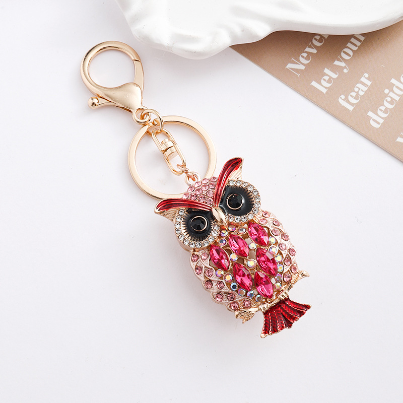 Europa y América creativa transfronteriza estilo hueco búho llavero de metal con diamantes bolsos de automóviles para animales colgantes de regalo