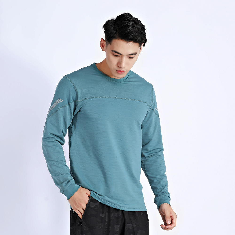 El otoño y el invierno de los hombres de deportes camiseta superior al aire libre de la aptitud de secado rápido de manga larga estiramiento suelto más tamaño en la acción al por mayor A