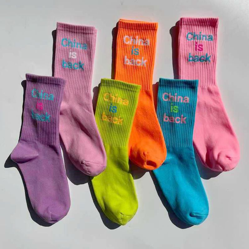 Trendy ins Internet celebrity men's and women's colorful mid-calf socks Japanese college style European and American Street skateboard cute stockings fashion
