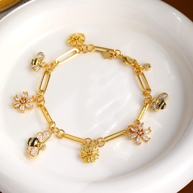 Braccialetto placcato in oro con zirconi e fiori di ape, leggero, lussuoso, di alta qualità, per donne europee e americane_voghion.com