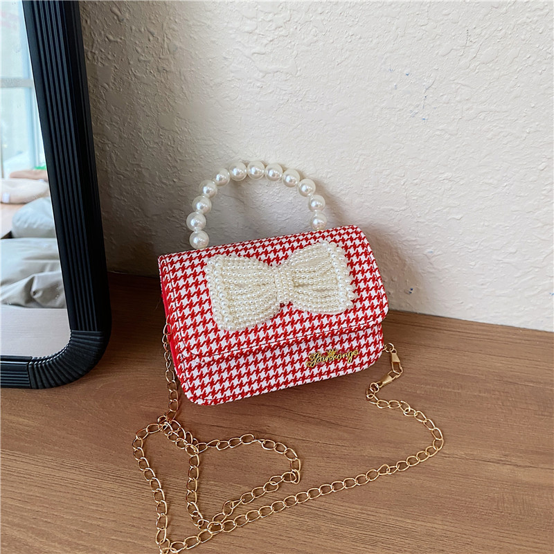 Mochila de niños estilo extranjero princesa perla de viento pequeño cambio bolso de hombro de niña encantadora