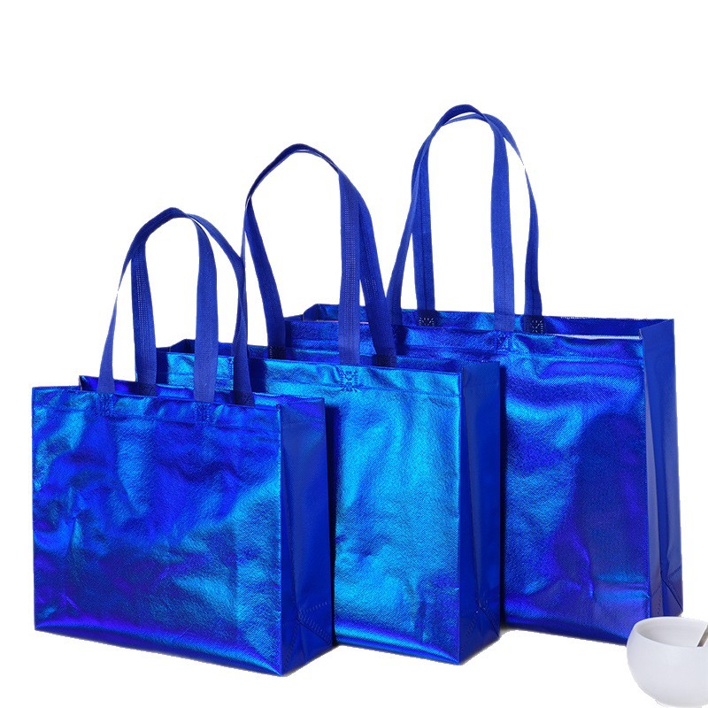 Bolsas de tela no tejida láser coloridas personalizadas logotipo de marca de moda bolsas de zapatos de mujer regalos de compras personalizados