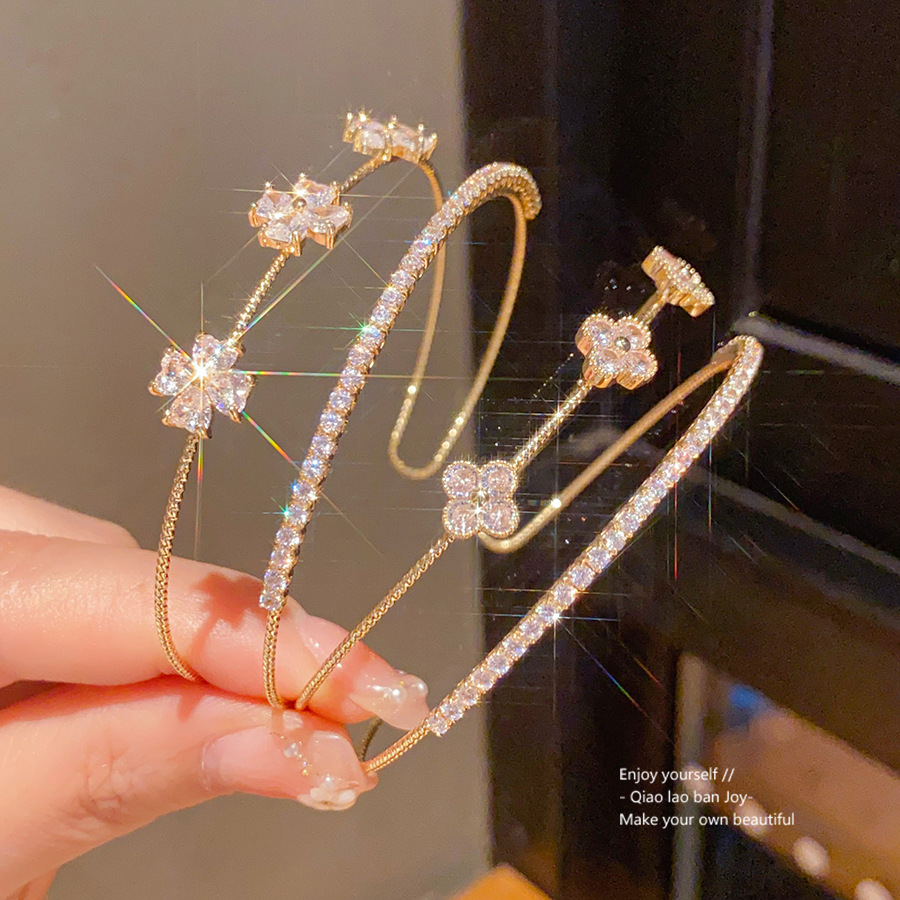 ジルコンの花の十字の二重の開口の腕輪の軽くて豪華な高級感の手環のファッションのinsの百合の手飾りの卸売り